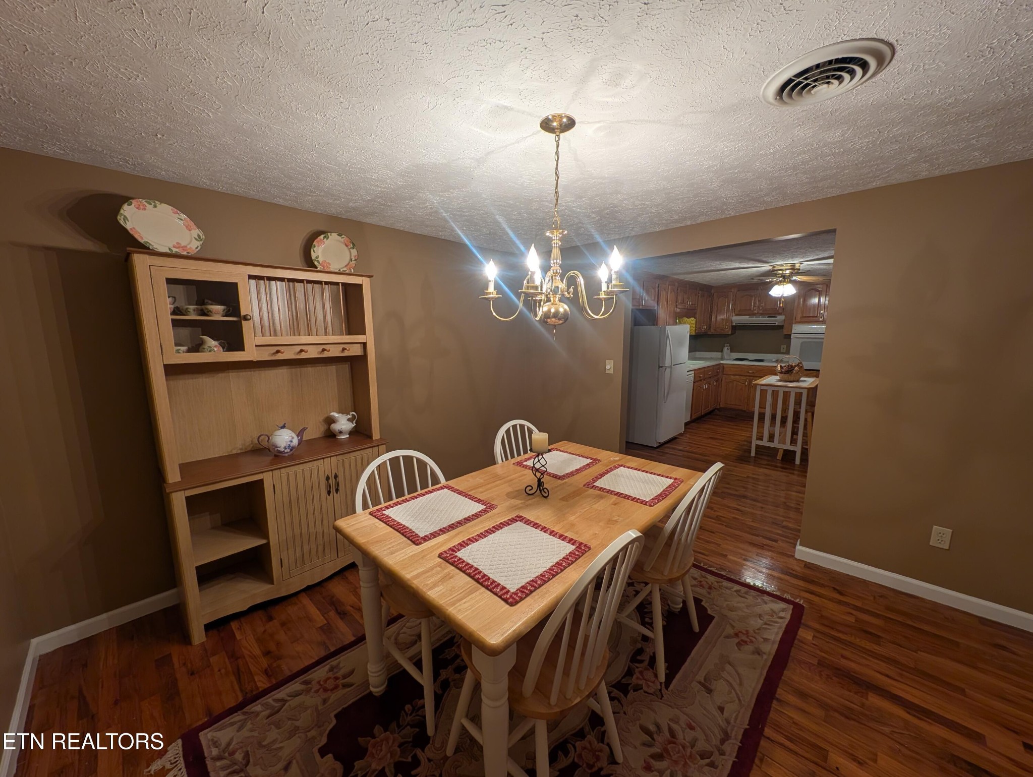 1729 Roslin Road Jamestown, TN 38556 - Photo 23 of 49 a view of a dining room with furniture and chandelier