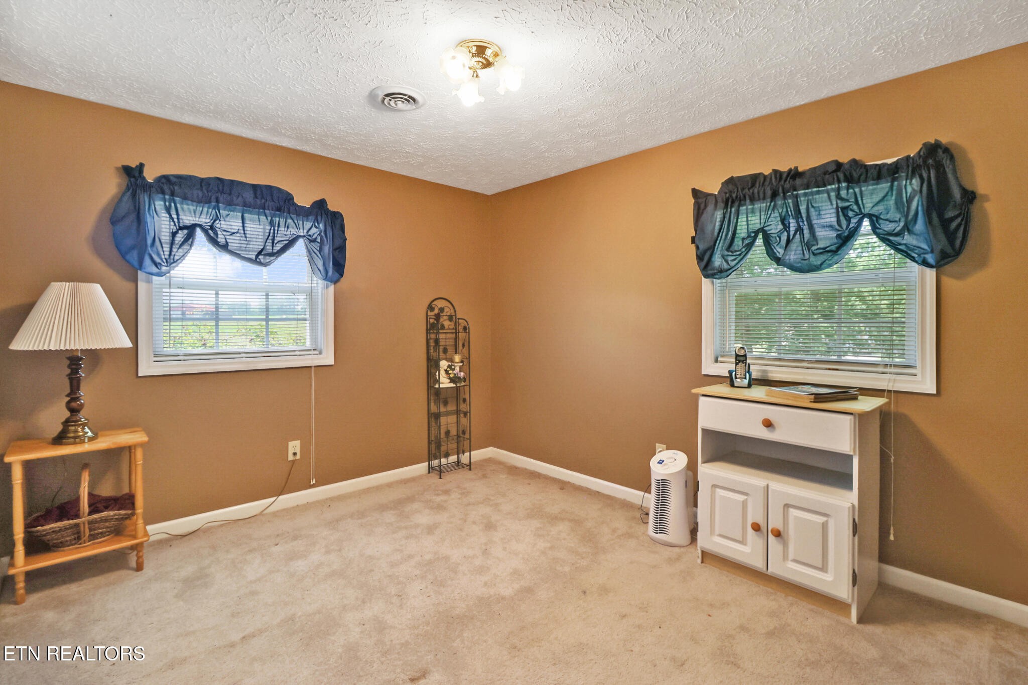 1729 Roslin Road Jamestown, TN 38556 - Photo 30 of 49 a view of a bedroom with a window