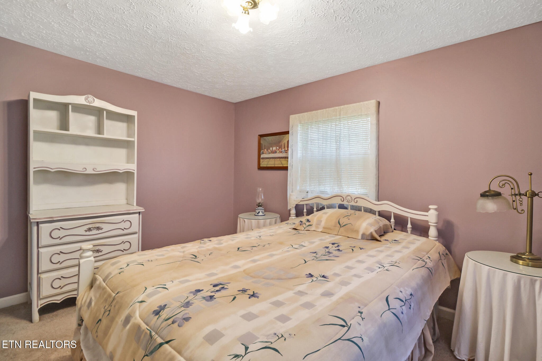 1729 Roslin Road Jamestown, TN 38556 - Photo 34 of 49 a bedroom with a bed and a window