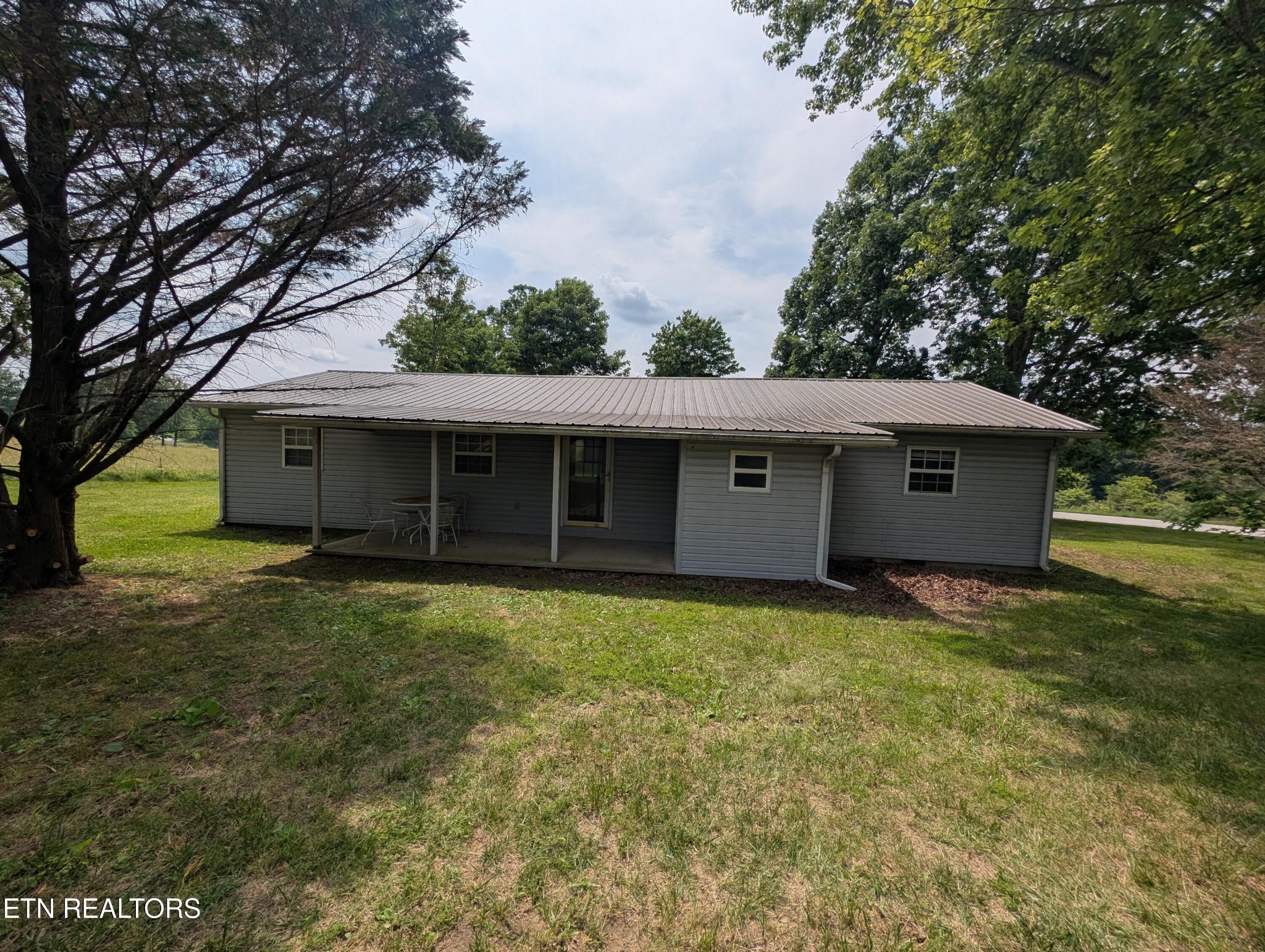1729 Roslin Road Jamestown, TN 38556 - Photo 41 of 49 a view of a house with a yard