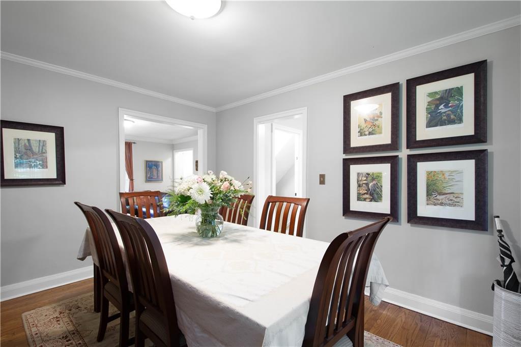 454 Sulgrave Road Pittsburgh, PA 15211 - Photo 11 of 50 a view of a a dining room with furniture window and wooden floor