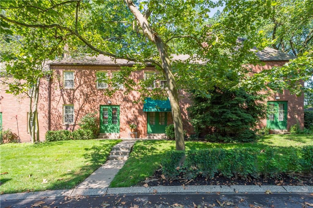 454 Sulgrave Road Pittsburgh, PA 15211 - Photo 36 of 50 a front view of a house with garden