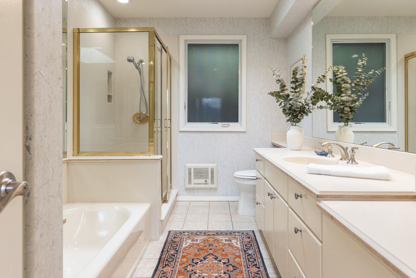 26177 Scenic Road Carmel, CA 93923 - Photo 24 of 30 a bathroom with a tub sink and mirror