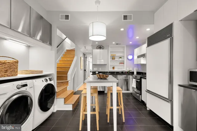 a view of a kitchen with a stove cabinets and a view of kitchen