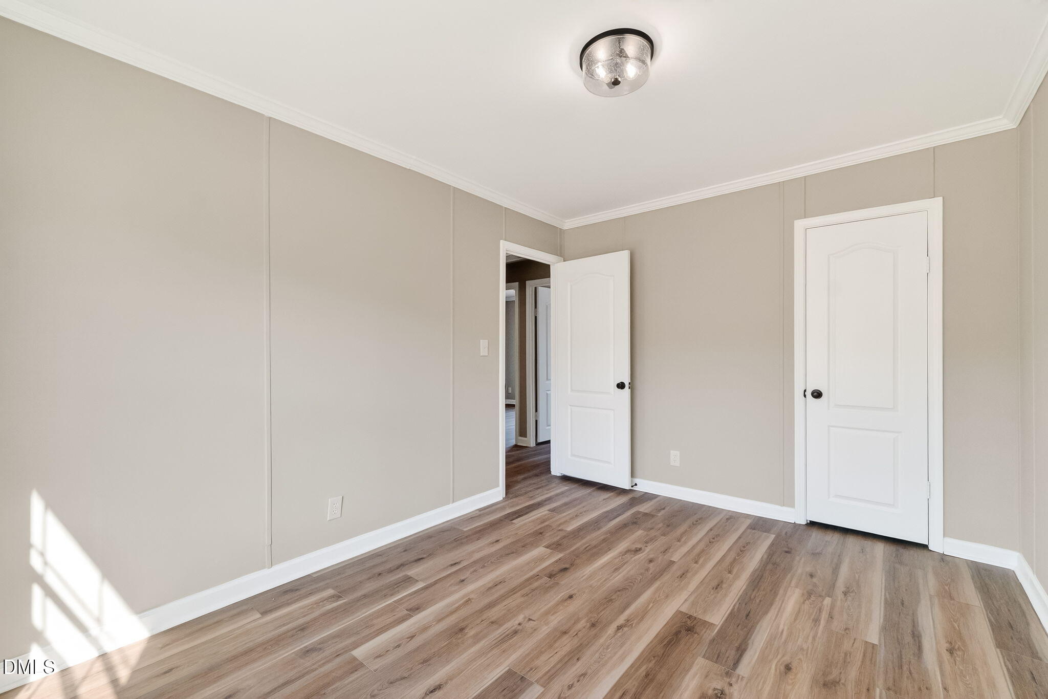 10015 Smith Road Middlesex, NC 27557 - Photo 33 of 48 a view of an empty room and wooden floor