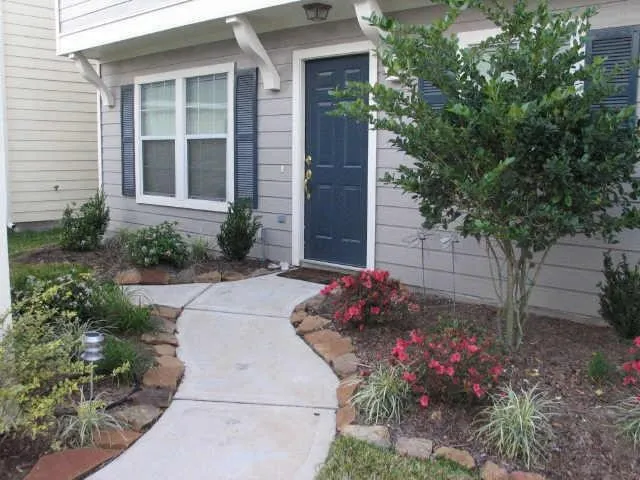 a house view with a outdoor space