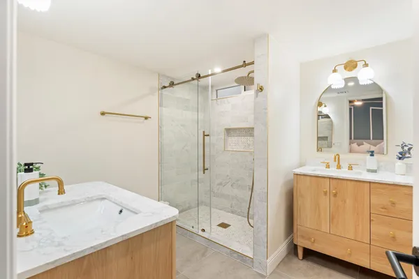 a bathroom with a sink and a mirror
