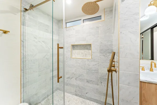 an aerial view of a house with a yard and garden