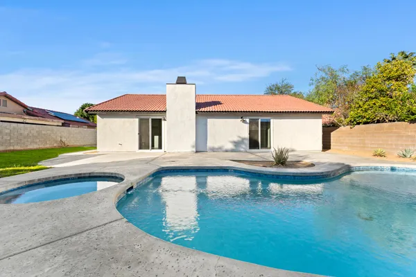 swimming pool view with a outdoor space