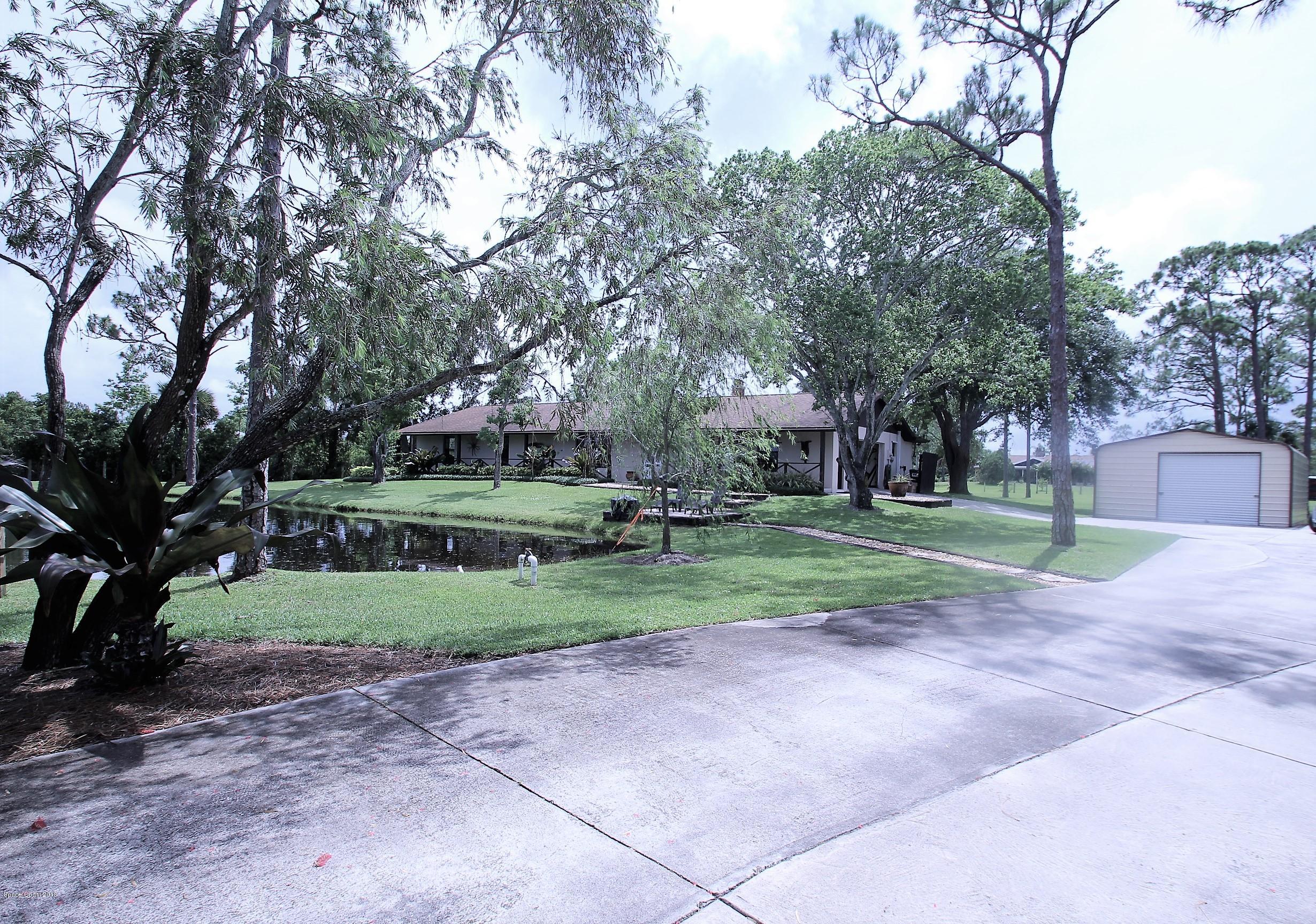 2720 Weber Road Malabar, FL 32950 - Photo 5 of 41 Drive Way View to House