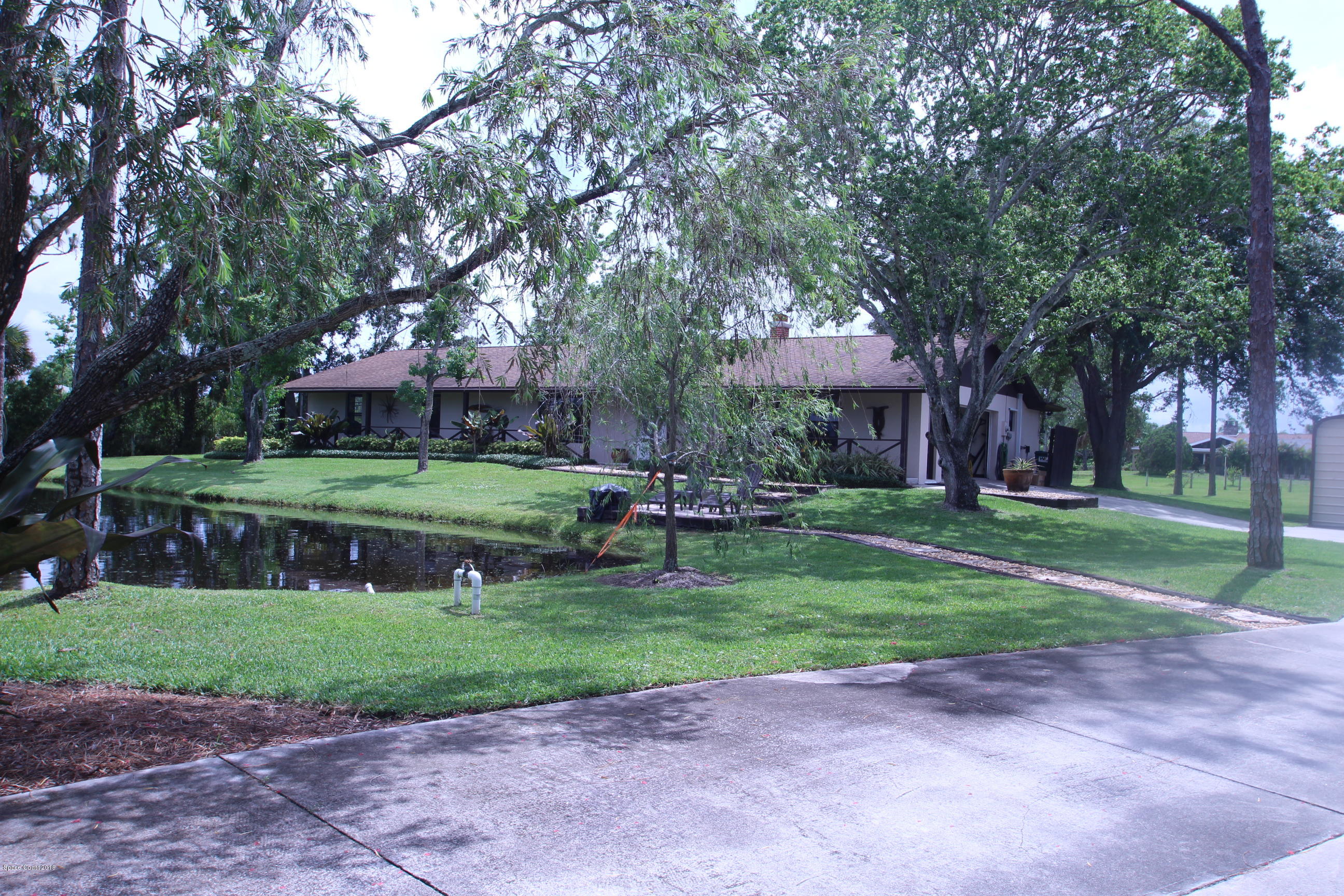 2720 Weber Road Malabar, FL 32950 - Photo 6 of 41 Side Front View