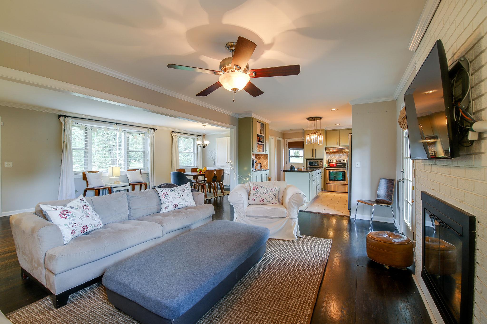 100 Chiroc Road Hendersonville, TN 37075 - Photo 12 of 28 Living room far end back to kitchen and door to side patio area It's really fabulous space for entertaining or hosting your friends and family.