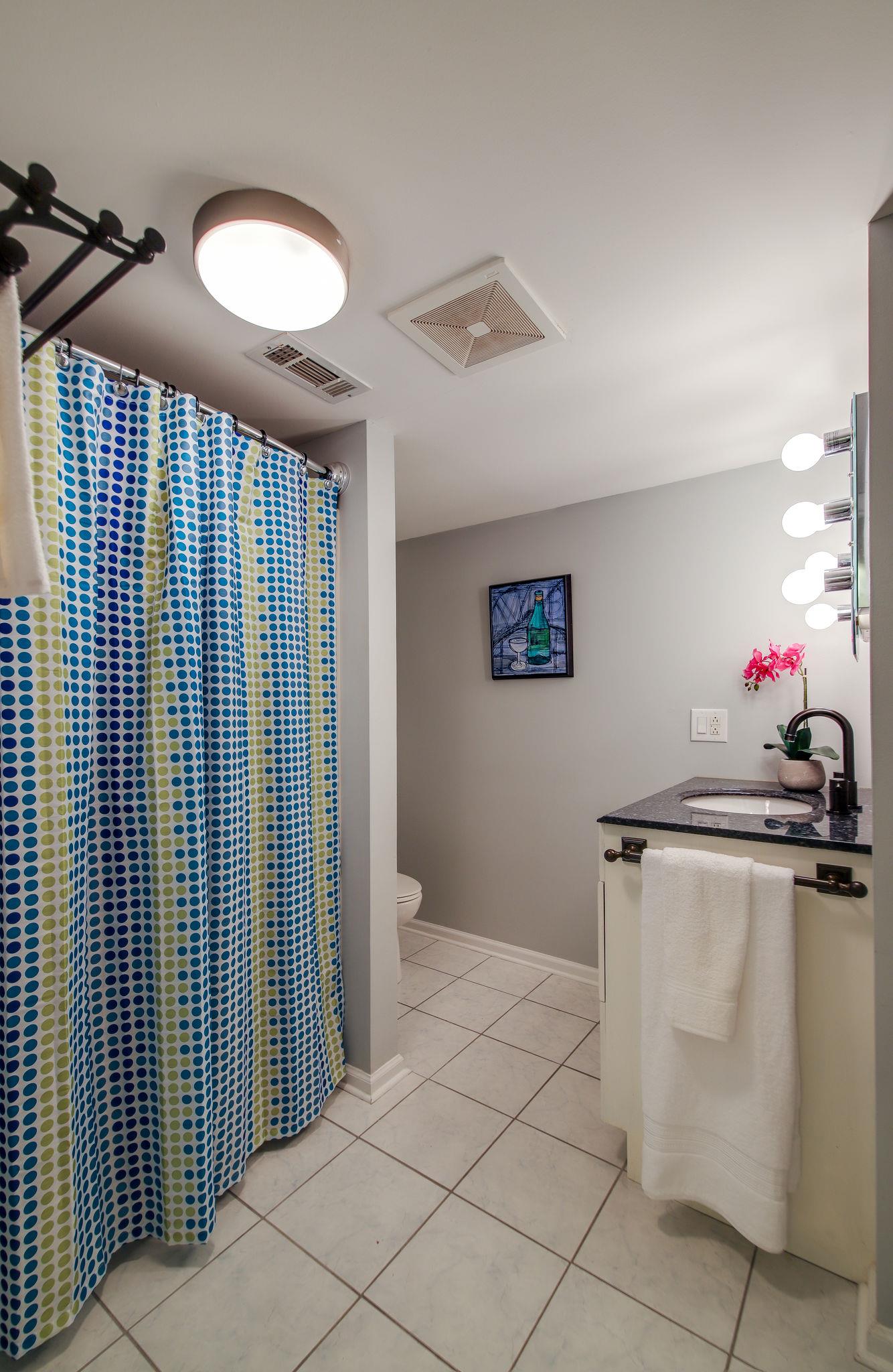 100 Chiroc Road Hendersonville, TN 37075 - Photo 21 of 28 Downstairs full bath with shower, tile, vanity with large drawers. Tucked away in a private corner.