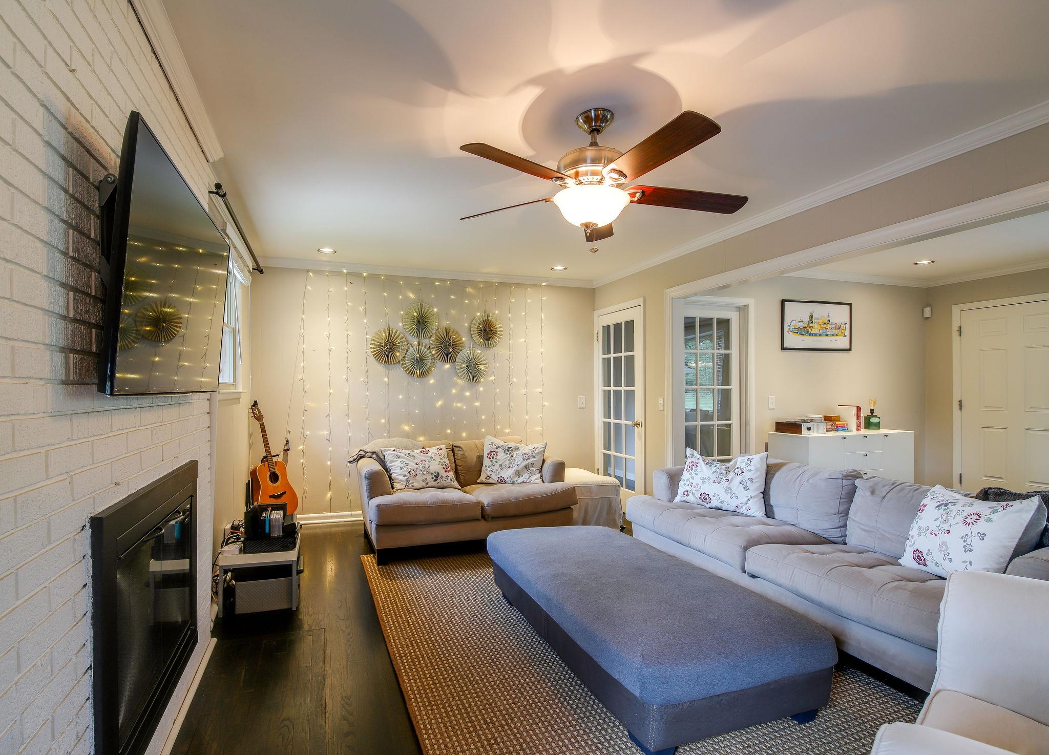 100 Chiroc Road Hendersonville, TN 37075 - Photo 10 of 28 Living room to hall with fireplace on the left side.