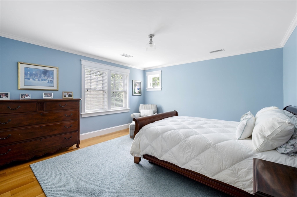 25 Mohawk Way Cohasset, MA 02025 - Photo 24 of 34 a bedroom with a bed and window