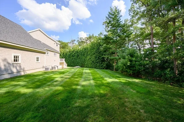 a view of a backyard with garden