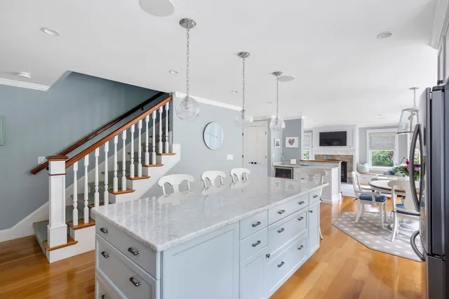 a kitchen with sink and cabinets
