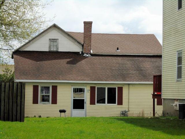 609 North 3rd Street Rochelle, IL 61068 - Photo 9 of 15 a house view with a garden space