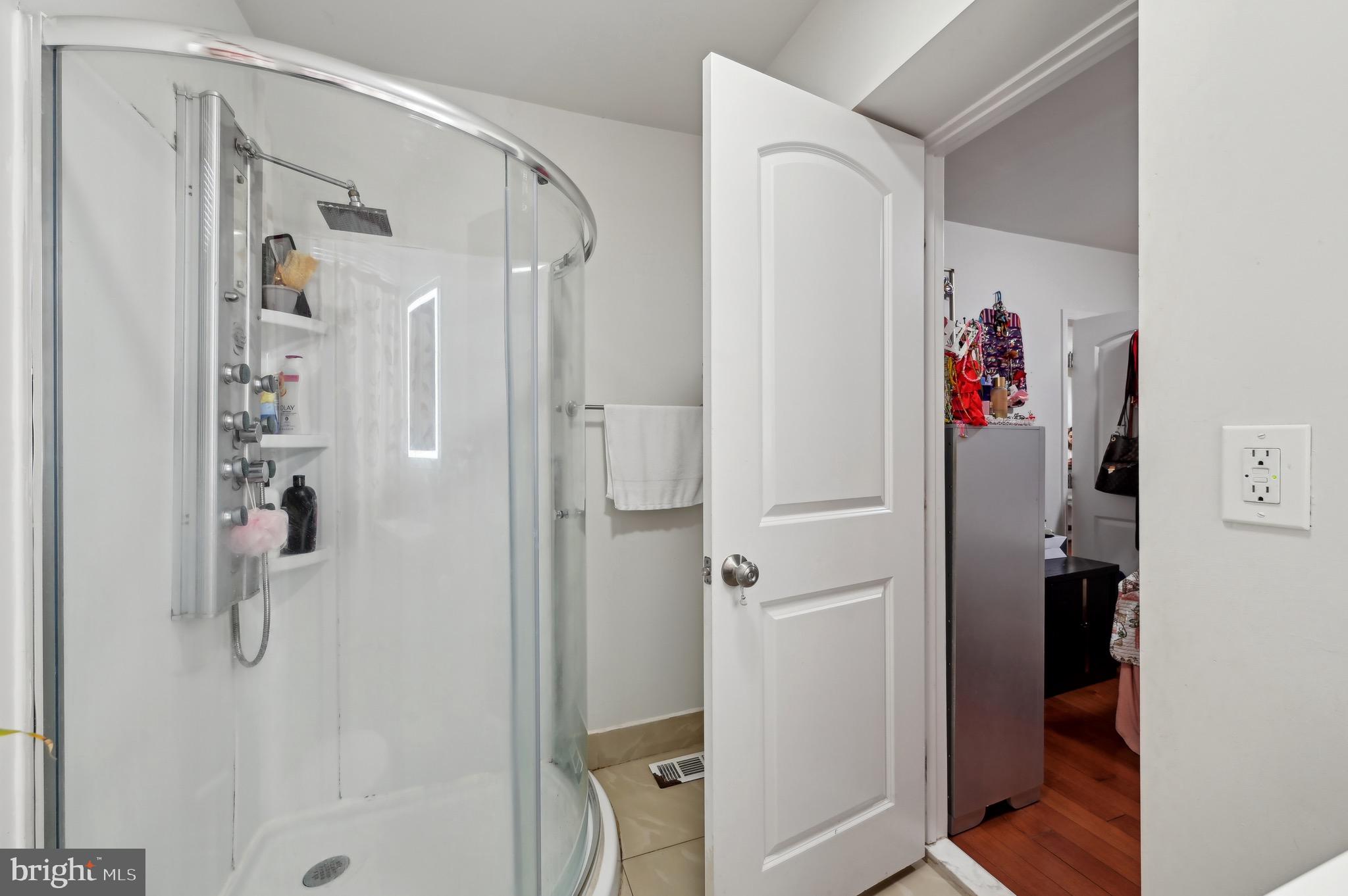 4101 Oak Road Baltimore, MD 21227 - Photo 17 of 25 a bathroom with a shower