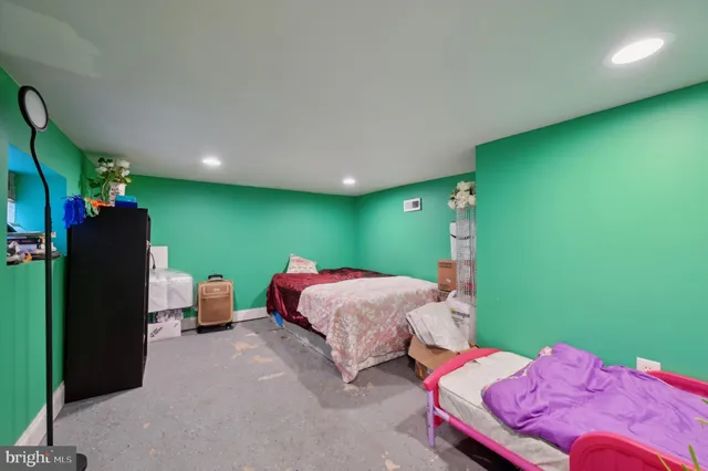 a bed room with a bed and a window