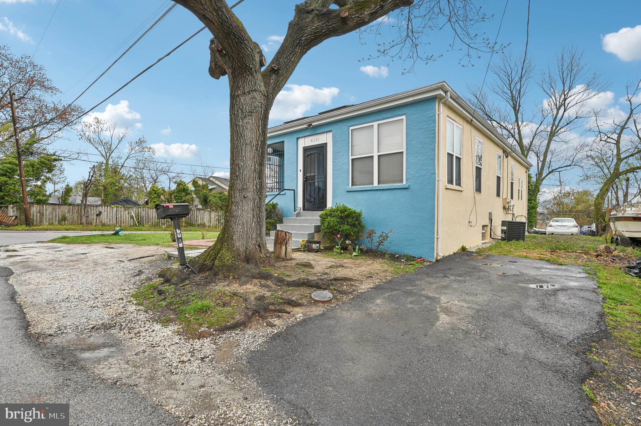 4101 Oak Road Baltimore, MD 21227 - Photo 2 of 25 a view of a house with a yard