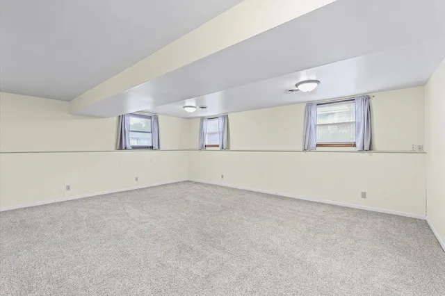 an empty room with window