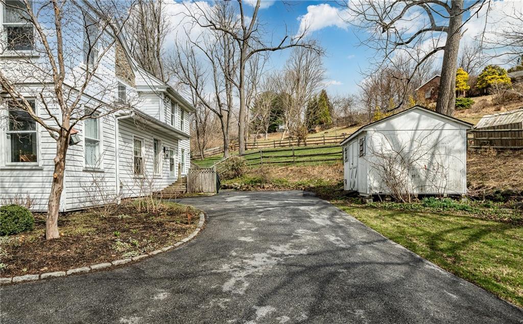701 Oakbourne Road West Chester, PA 19382 - Photo 40 of 50 a view of a house with a yard
