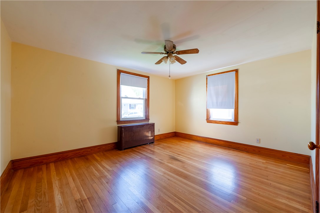 27 Eaton Street Pawtucket, RI 02861 - Photo 11 of 27 Second bed also has hardwood floors and ceiling fan