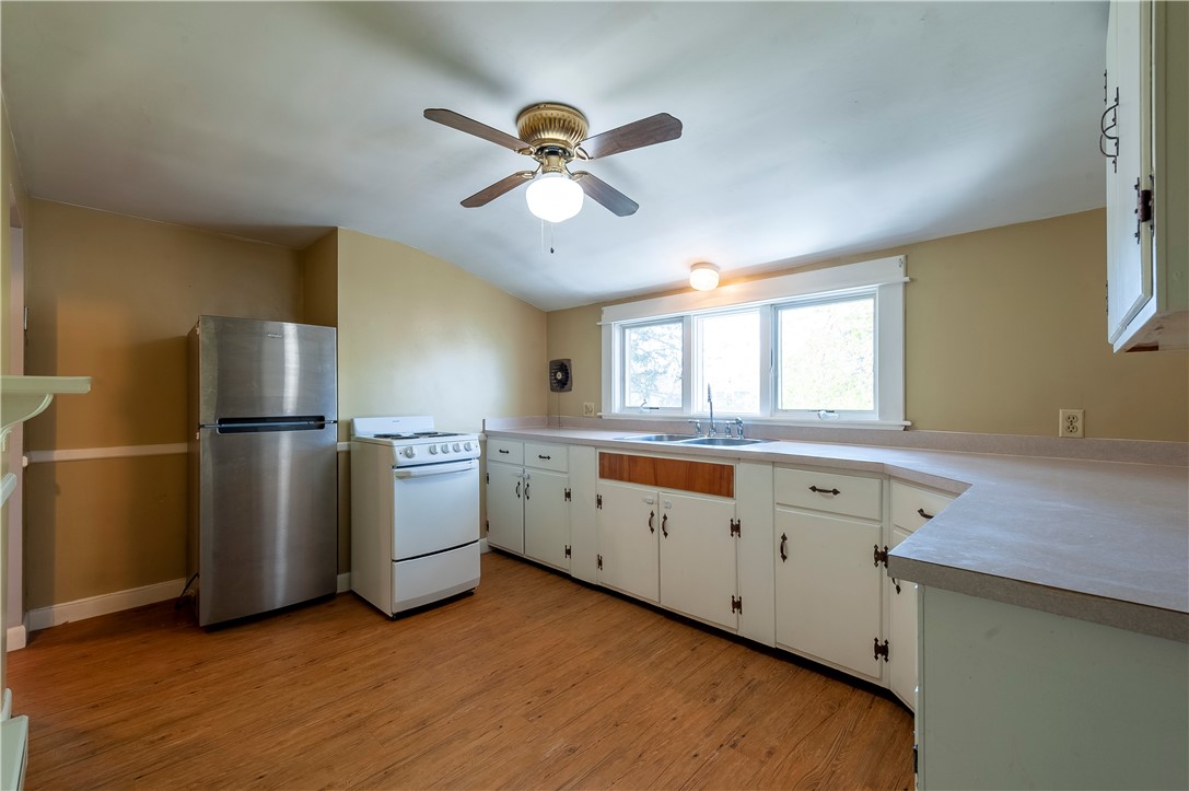 27 Eaton Street Pawtucket, RI 02861 - Photo 13 of 27 Spacious kitchen on second floor with laminate flooring
