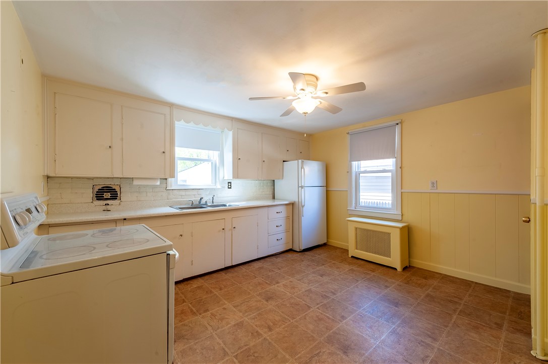 27 Eaton Street Pawtucket, RI 02861 - Photo 5 of 27 Large eat-in-kitchen with vinyl flooring.
