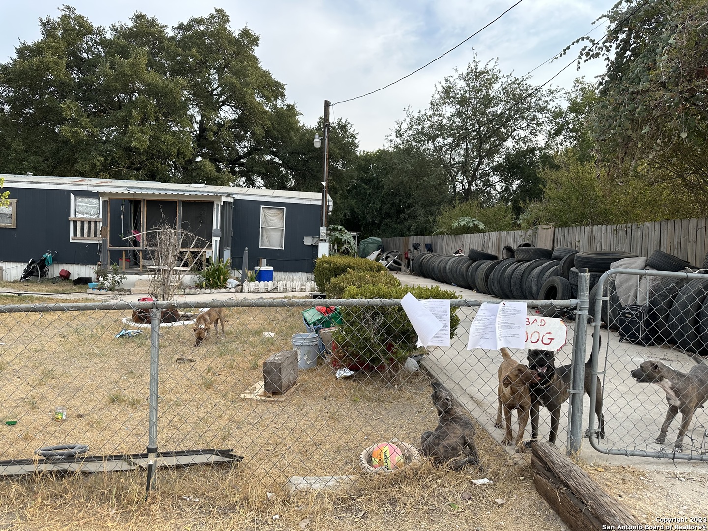 4208 Twin Valley Von Ormy, TX 78073 - Photo 1 of 1 a view of a backyard with couches table and chairs