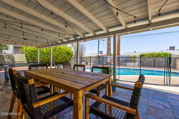 a outdoor dining space with furniture and outdoor space
