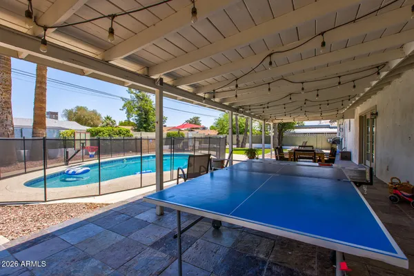 a view of a balcony with chairs