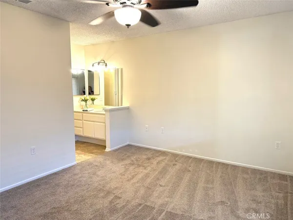 a view of a kitchen with a sink