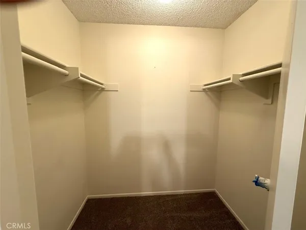 a view of small space with racks on the wall