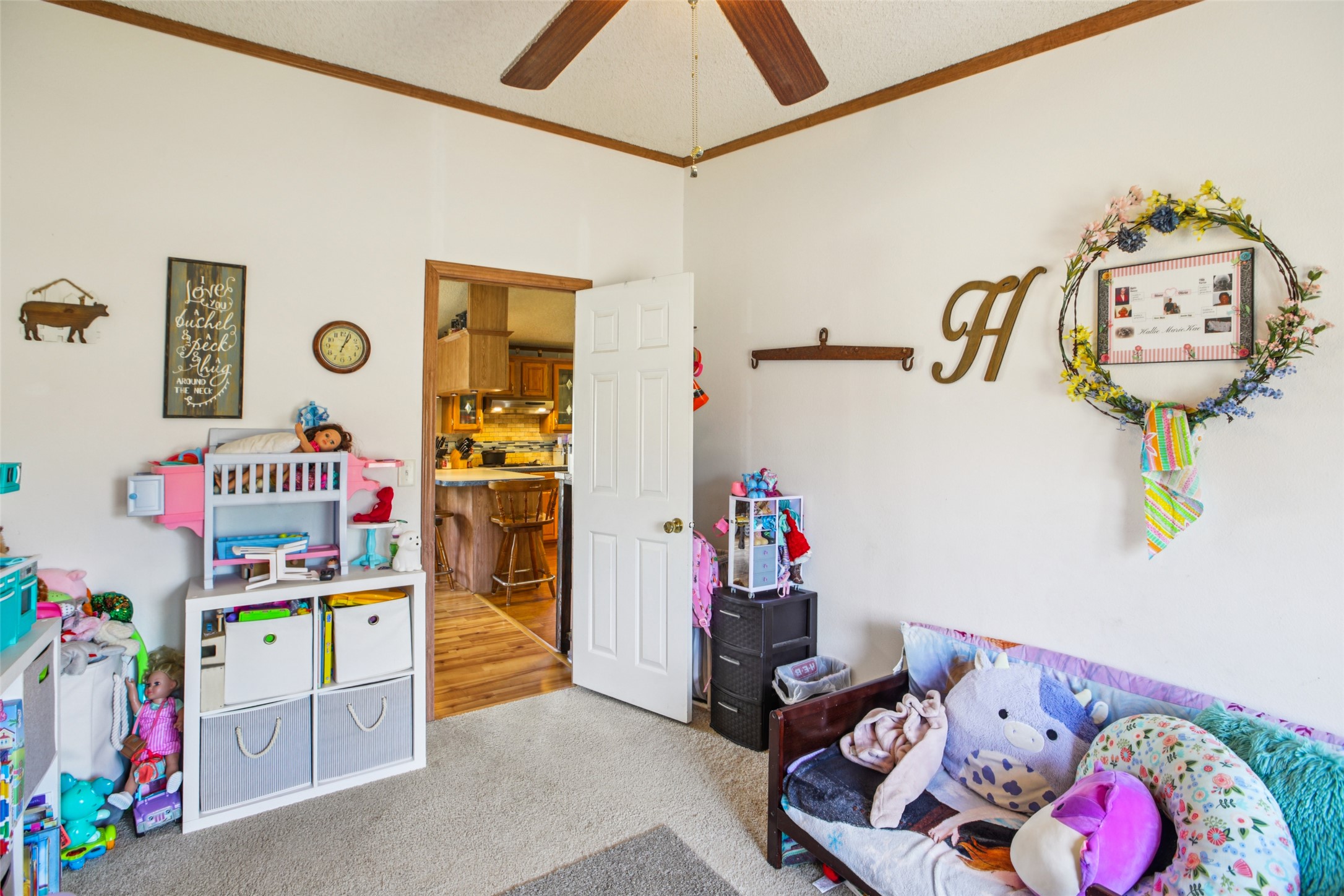 372 Hofferek Road Rosanky, TX 78953 - Photo 22 of 40 Rec room featuring light carpet, crown molding, and ceiling fan