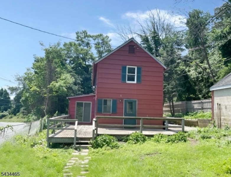 438 Old Dover Road Morris Plains, NJ 07950 - Photo 2 of 10 a front view of a house with a yard