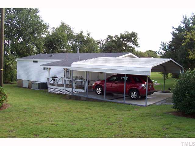 2766 Tarheel Road Benson, NC 27504 - Photo 3 of 8 2 vehicle carport with concrete pad!