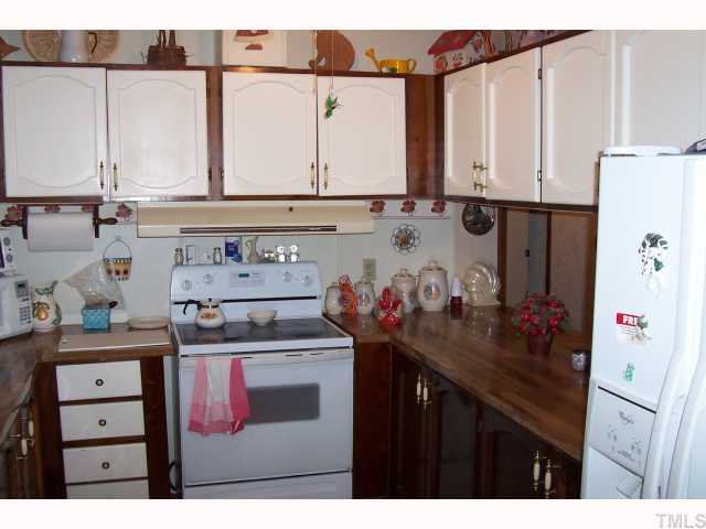 2766 Tarheel Road Benson, NC 27504 - Photo 5 of 8 Refrigerator stays with home.