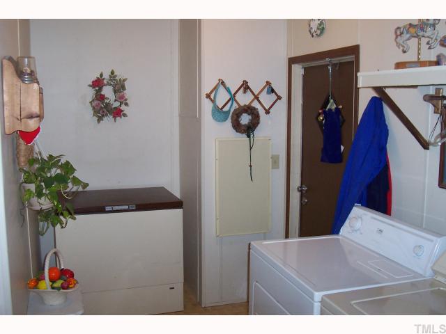 2766 Tarheel Road Benson, NC 27504 - Photo 6 of 8 Washer & dryer stay with this wonderful home.