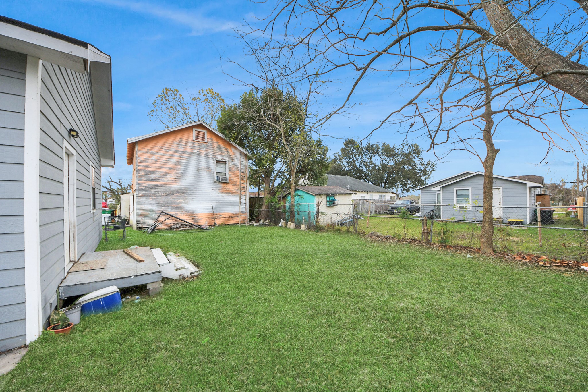 15 High Street Baytown, TX 77520 - Photo 26 of 29 a view of a house with a backyard