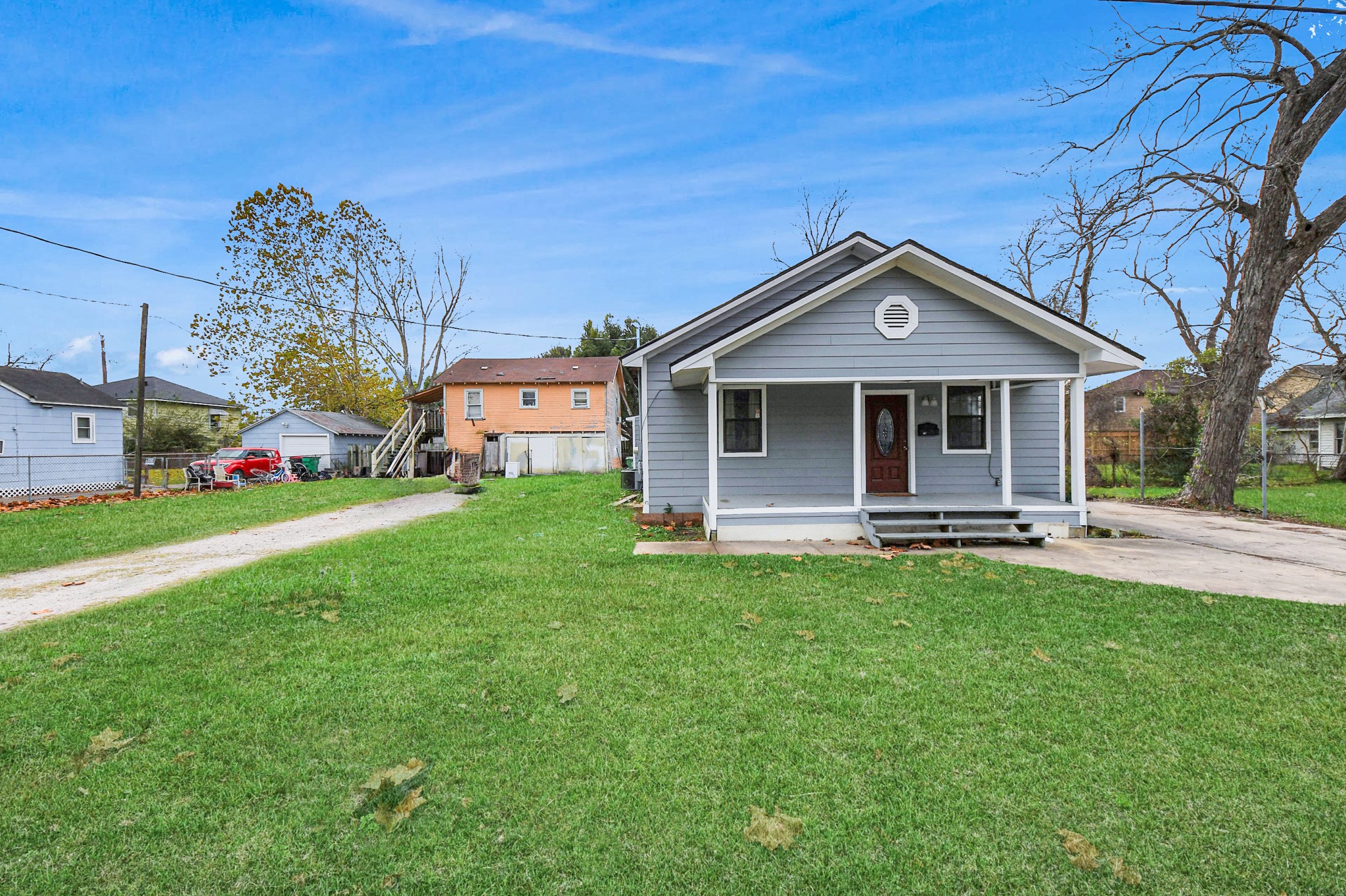 15 High Street Baytown, TX 77520 - Photo 29 of 29 a front view of a house with a yard