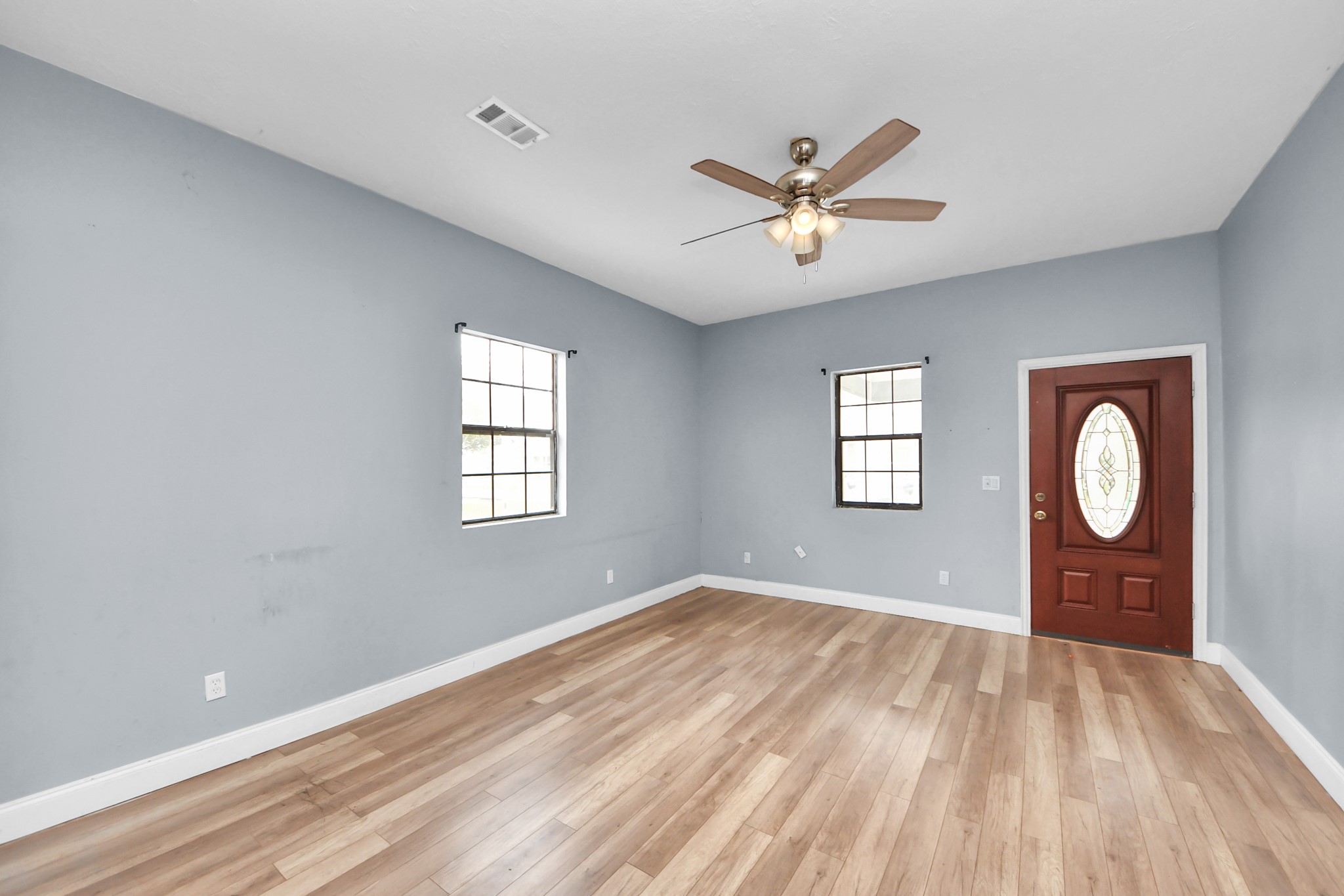 15 High Street Baytown, TX 77520 - Photo 4 of 29 a view of a livingroom with a window