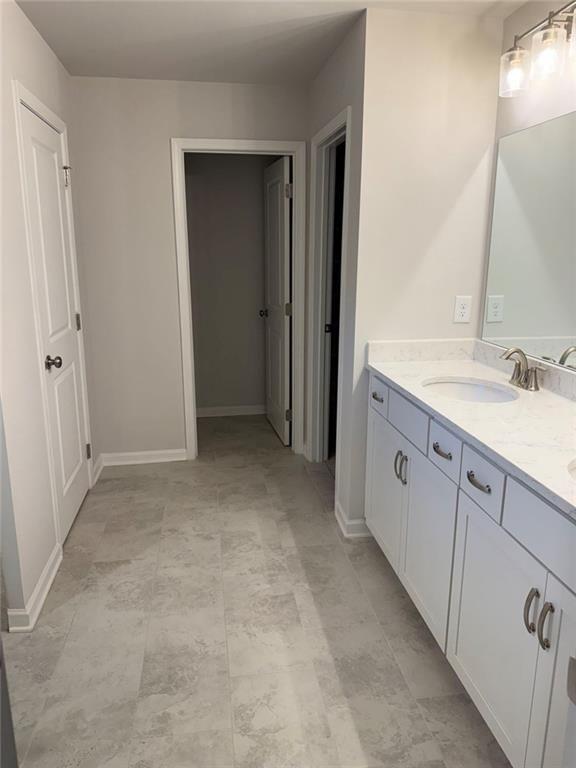 230 Mackenzie Court Covington, GA 30016 - Photo 15 of 23 a view of a bathroom with mirror