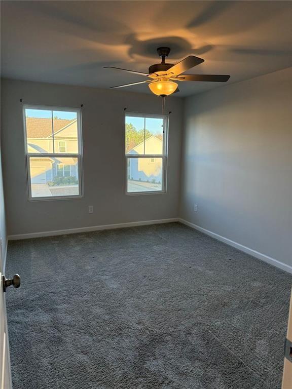 230 Mackenzie Court Covington, GA 30016 - Photo 23 of 23 an empty room with a window