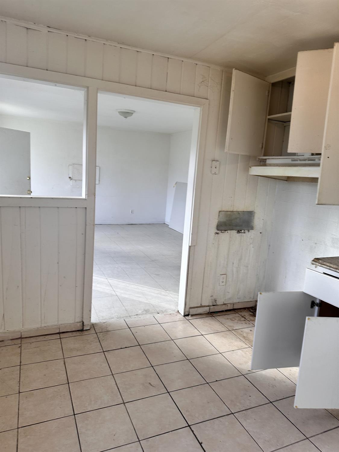 864 East Evening Glow Avenue Reedley, CA 93654 - Photo 12 of 18 a view of a livingroom with wooden floor and furniture