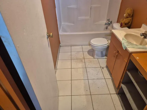 a bathroom with a sink and a toilet