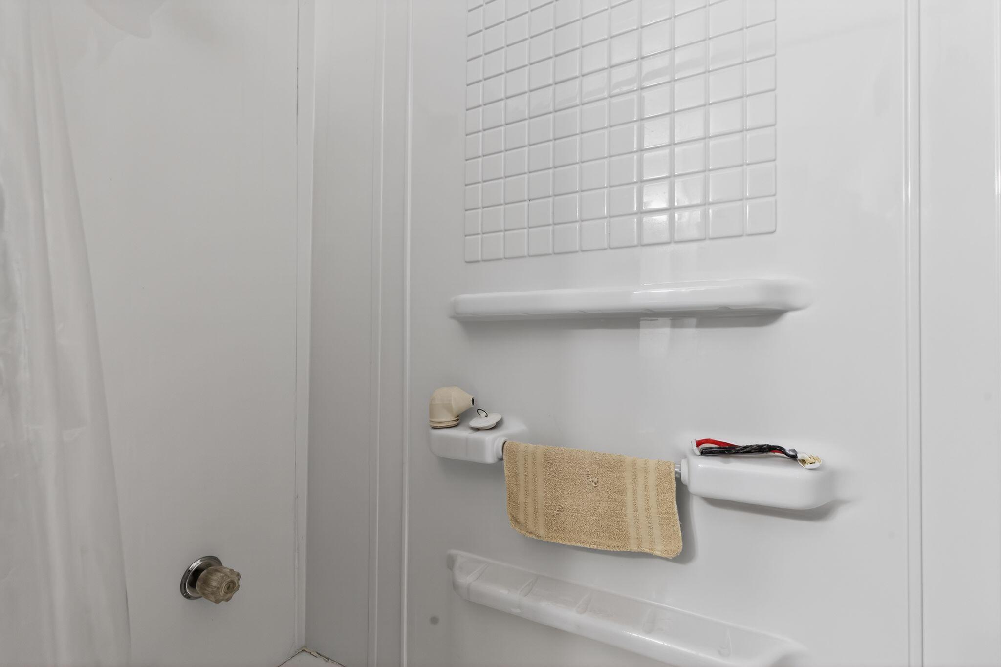 1027 Fox Street La Porte, IN 46350 - Photo 12 of 16 a bathroom with a bathtub