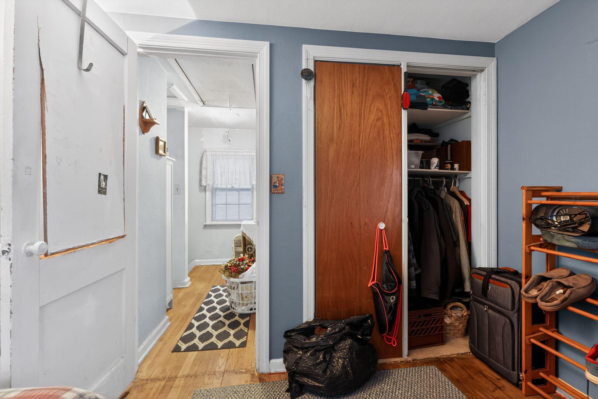 1027 Fox Street La Porte, IN 46350 - Photo 15 of 16 a walk in closet with wooden floor