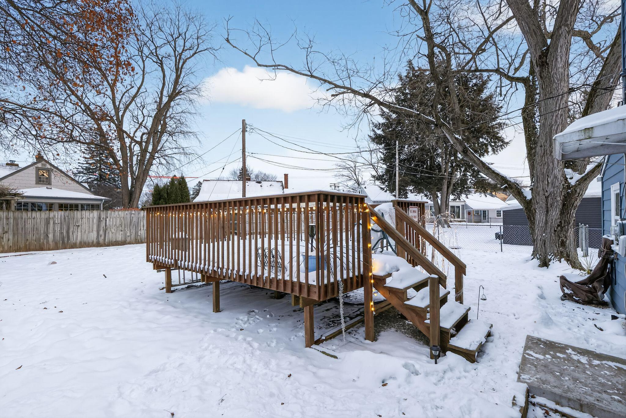 1027 Fox Street La Porte, IN 46350 - Photo 2 of 16 a view of backyard with deck and a garden